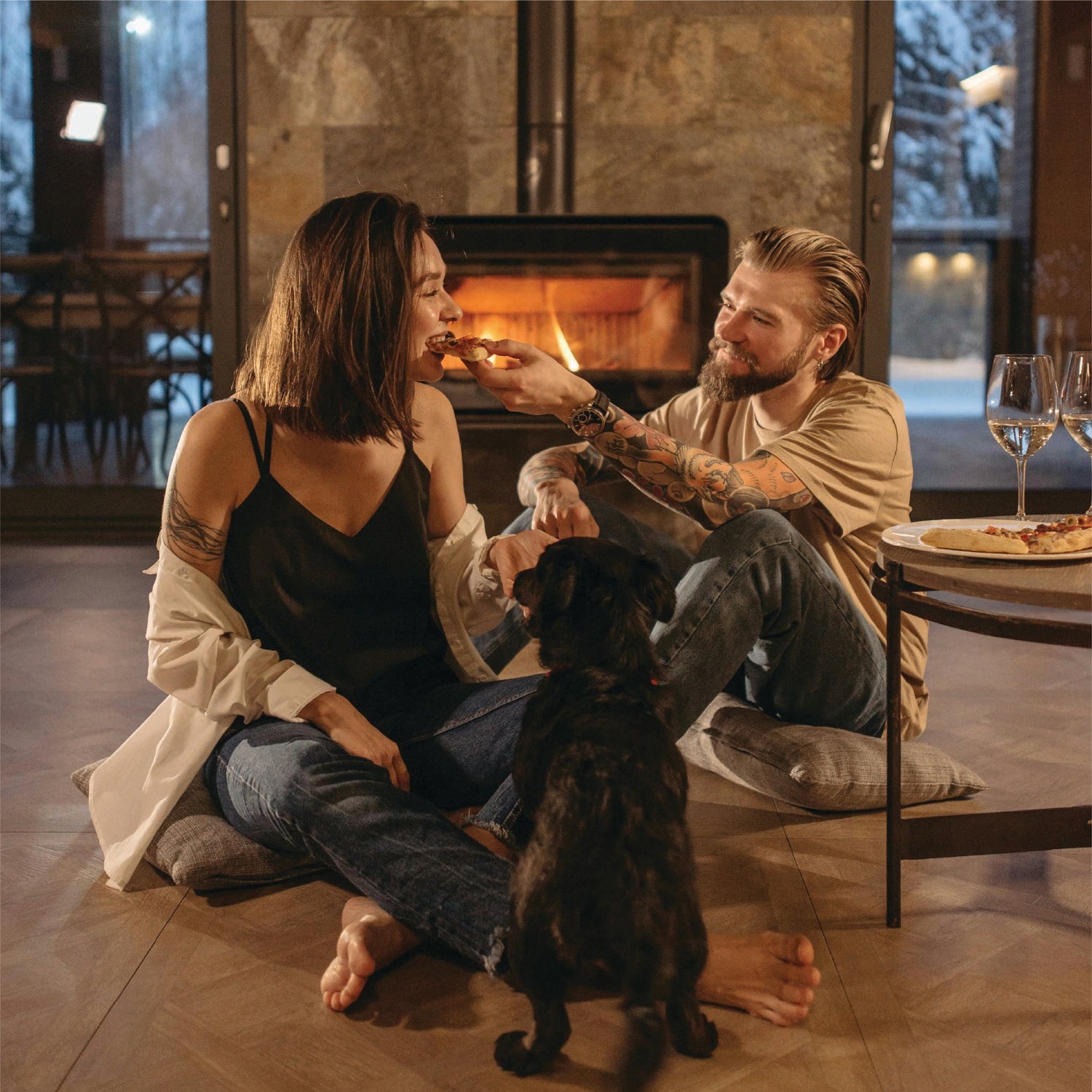 couple-in-front-of-fireplace